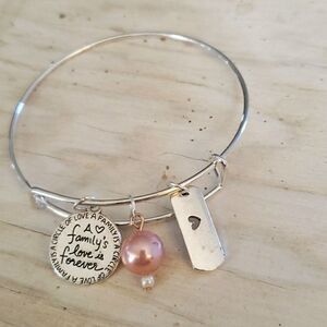 Bracelets by Sandra silver tone adjustable, A family's love is forever